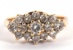 An 18k diamond ring, the navette shaped cluster ring set with small round diamonds, total