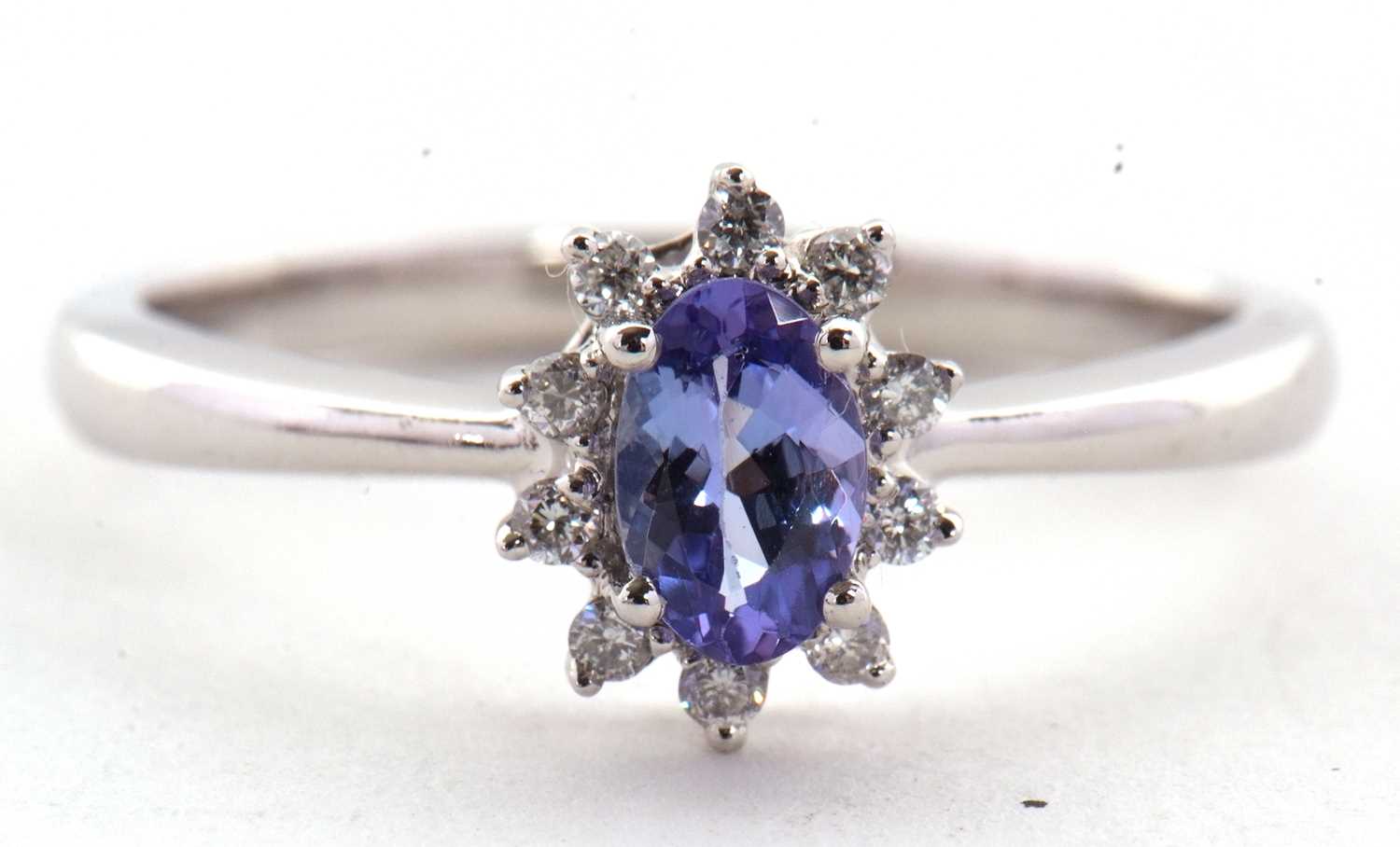 A platinum certified tanzanite and diamond ring, the oval claw mounted tanzanite, 0.36cts, - Image 3 of 9