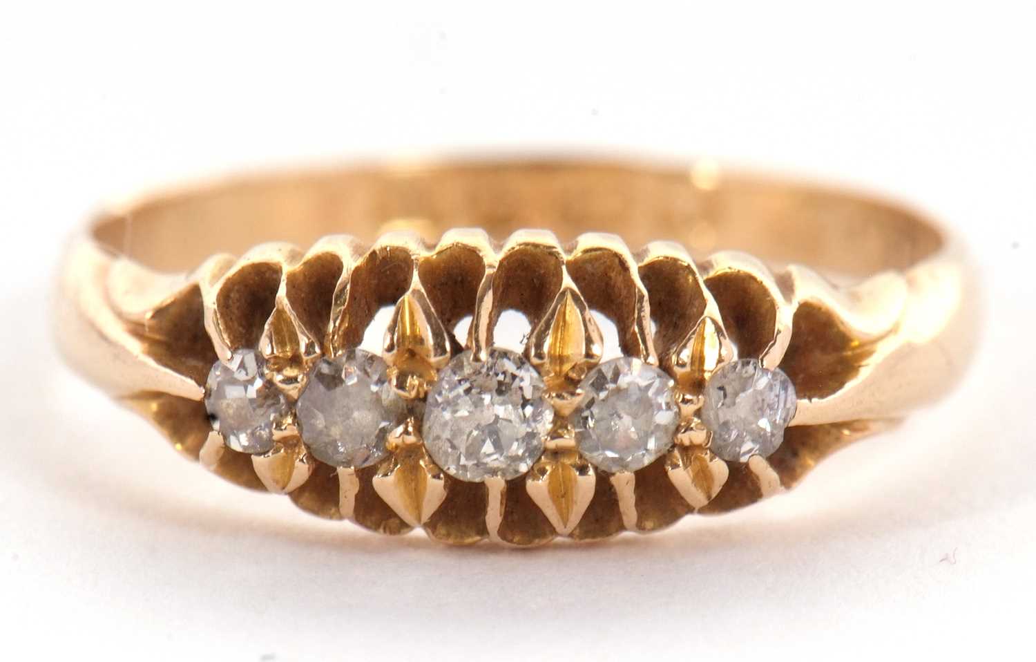 An 18ct diamond ring, the five old mine cut diamonds, all claw mounted to a plain band of yellow - Image 2 of 5