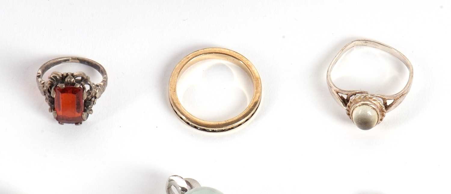 A mixed lot of jewellery to include a jade buddha pendant, 4cm long, two silver rings by Riflessi, - Image 2 of 4