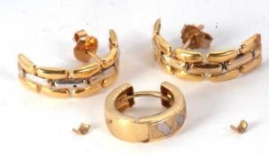 A pair of unmarked yellow metal half hoop earrings, 6.5mm wide, (tests as approx. 18ct gold), 4.