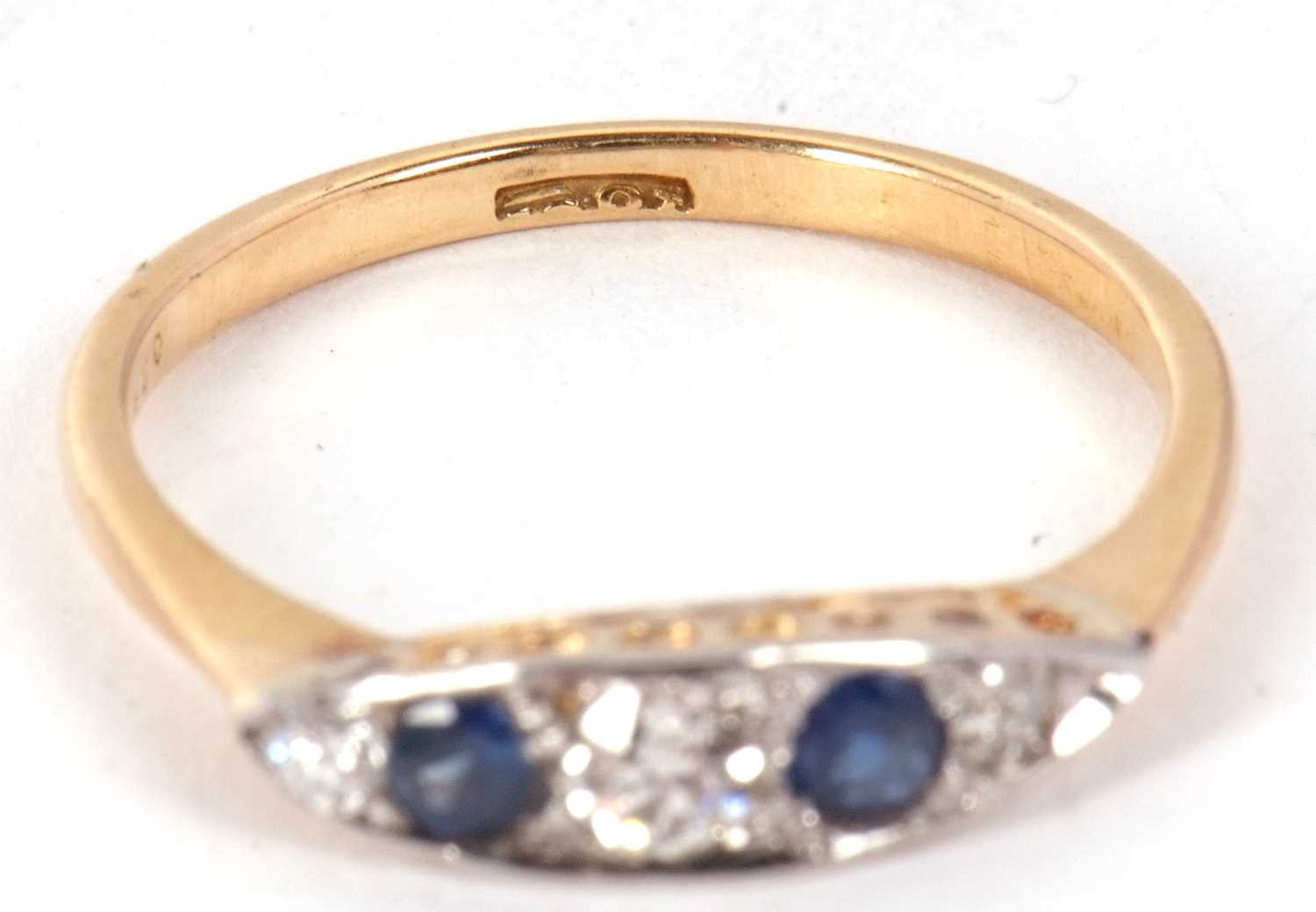 A sapphire and diamond ring, the marquise shape plaque set with alternating old mine cut diamonds - Image 4 of 7