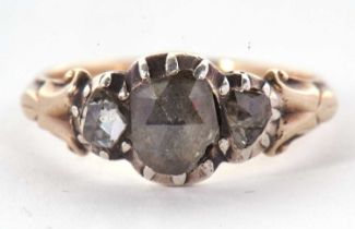 A rose cut diamond ring, the central rose cut diamond set with a smaller rose cut diamond to