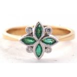 An 18ct emerald and diamond ring, the four marquise shape emeralds interspaced with small round