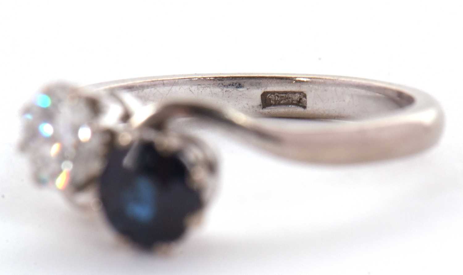 A sapphire and diamond 'toi et moi' ring, the round brilliant cut diamond, estimated approx. 0. - Image 6 of 7