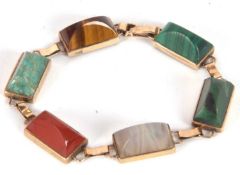 A gemset bracelet, the rectangular sugar loaf style cabochon gemstones, to include tigers eye,