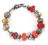 A Troll Beads bracelet, the silver bracelet with ornate lobster clasp stamped with makers mark 'LAA'