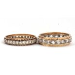 Two eternity rings, one with a central channel of white stones set in white metal with an outer band