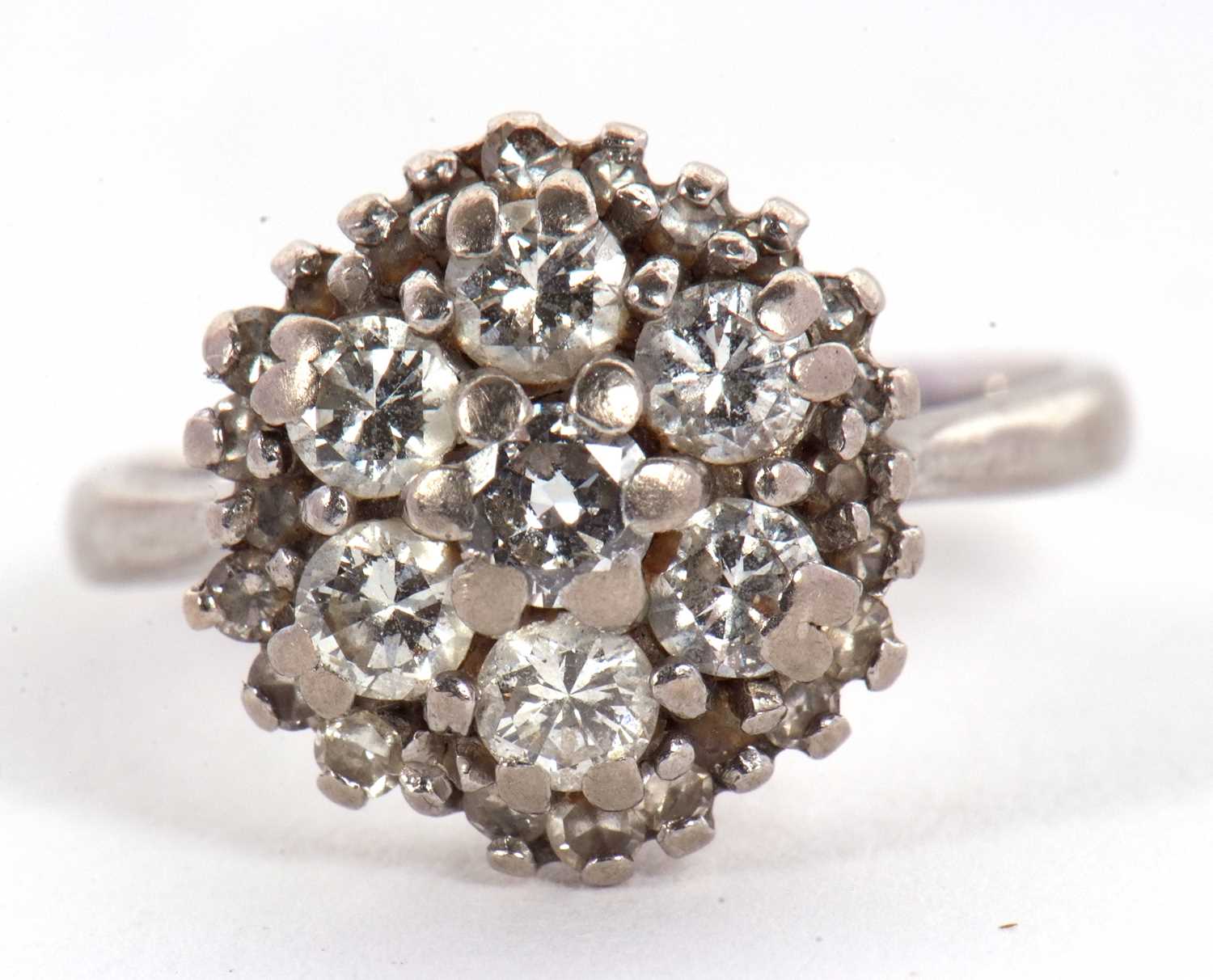 An 18ct diamond cluster ring, the round brilliant cut diamonds in a cluster formation surrounded - Image 2 of 7