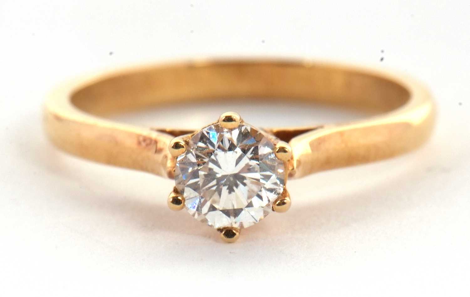 A diamond solitaire ring, the round brilliant cut diamond, stamped .50 to inner band, claw mounted - Image 5 of 7