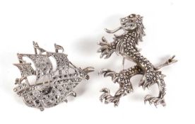 Two continental silver marcasite brooches, one of a galleon stamped 935, 38mm wide, the other of a