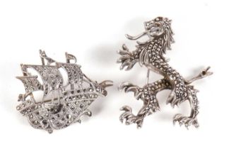 Two continental silver marcasite brooches, one of a galleon stamped 935, 38mm wide, the other of a