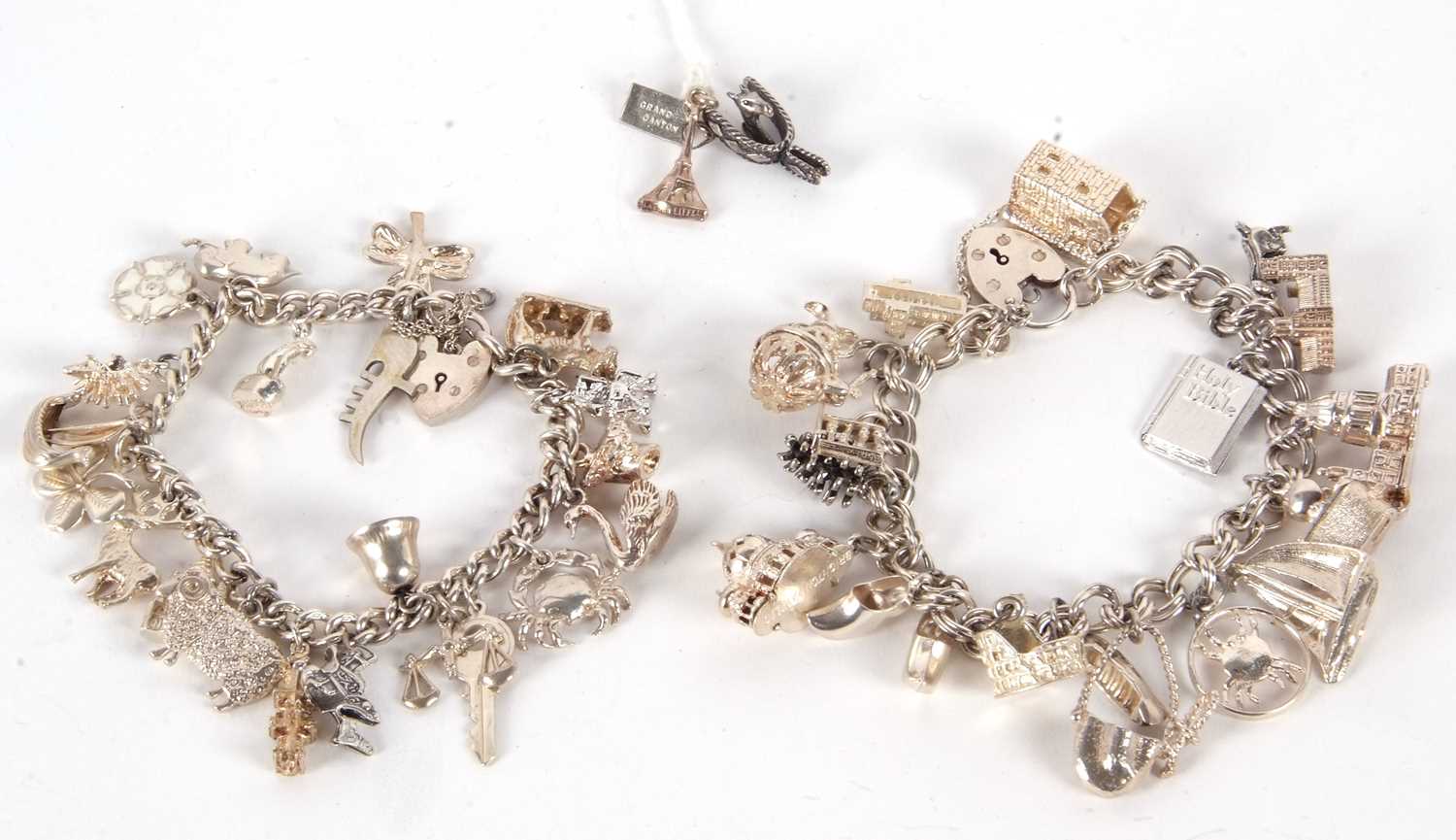 Two silver charm bracelets, both with curblink bracelets and heart shaped padlock clasps, one - Image 2 of 5