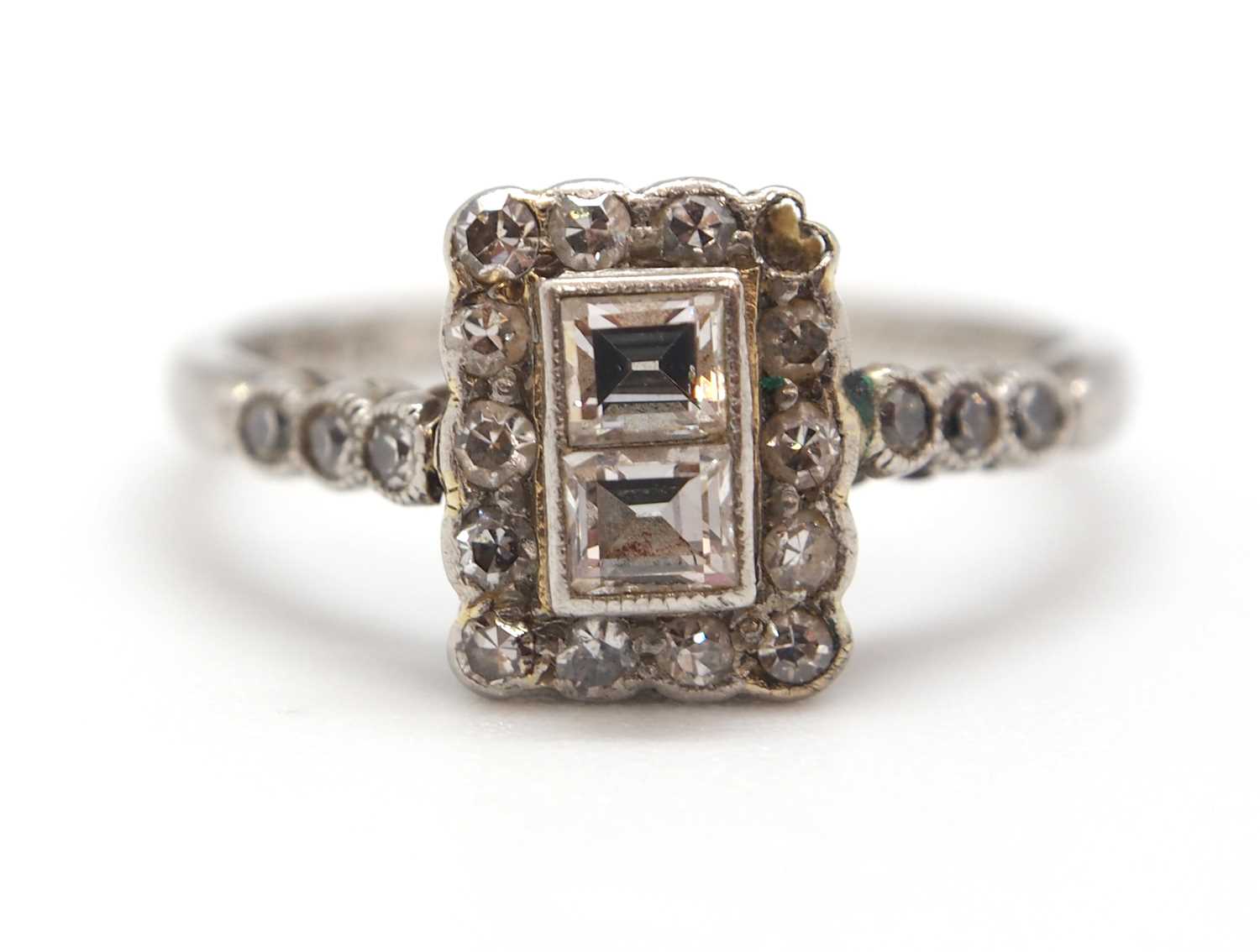 An Art Deco 18ct and platinum diamond ring, set to centre with two square step cut diamonds and - Image 5 of 9
