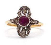 An Edwardian style 18ct ruby and diamond ring, the central round ruby set within a plaque set with