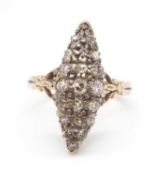 An early 20th century diamond plaque ring, the marquise shape ring set throughout with a mix of