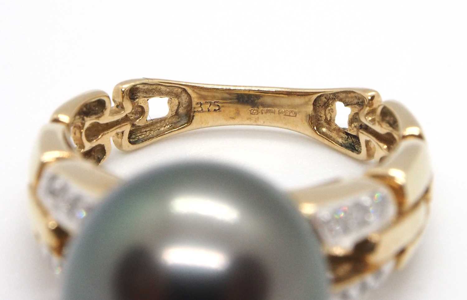 A 9ct cultured pearl and diamond ring, the round grey cultured pearl, approx. 12mm diameter, in a - Image 8 of 8