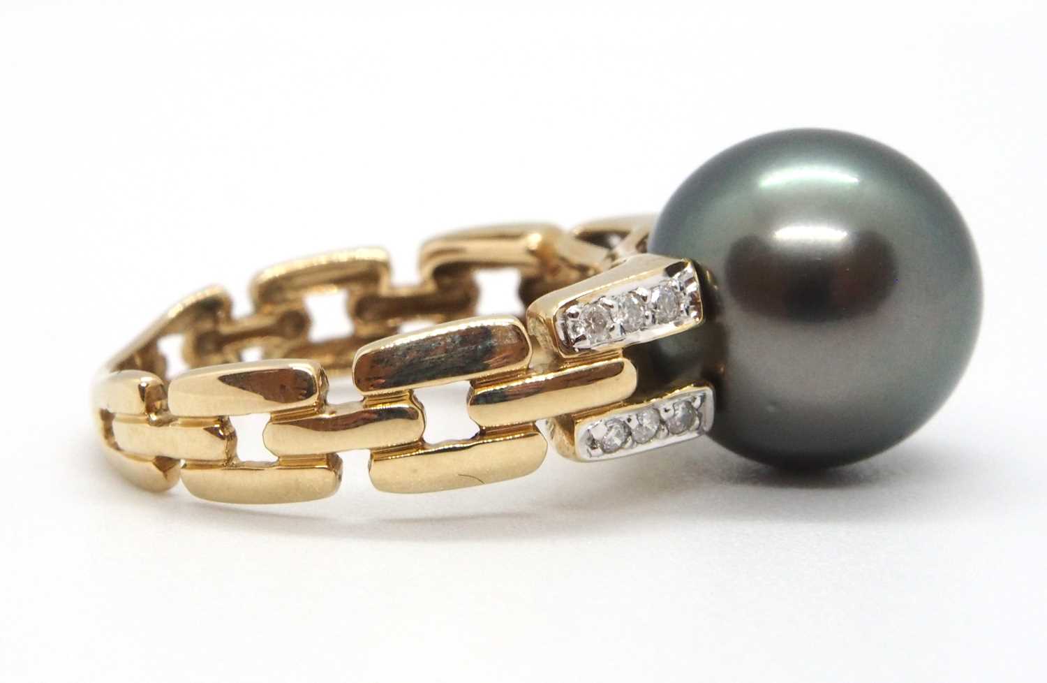 A 9ct cultured pearl and diamond ring, the round grey cultured pearl, approx. 12mm diameter, in a - Image 7 of 8