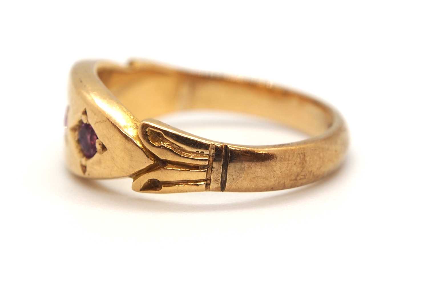 An 9ct ruby ring, the three round gypsy set rubies with plain band stamped 9ct, size I-J, 2.9g - Image 2 of 7