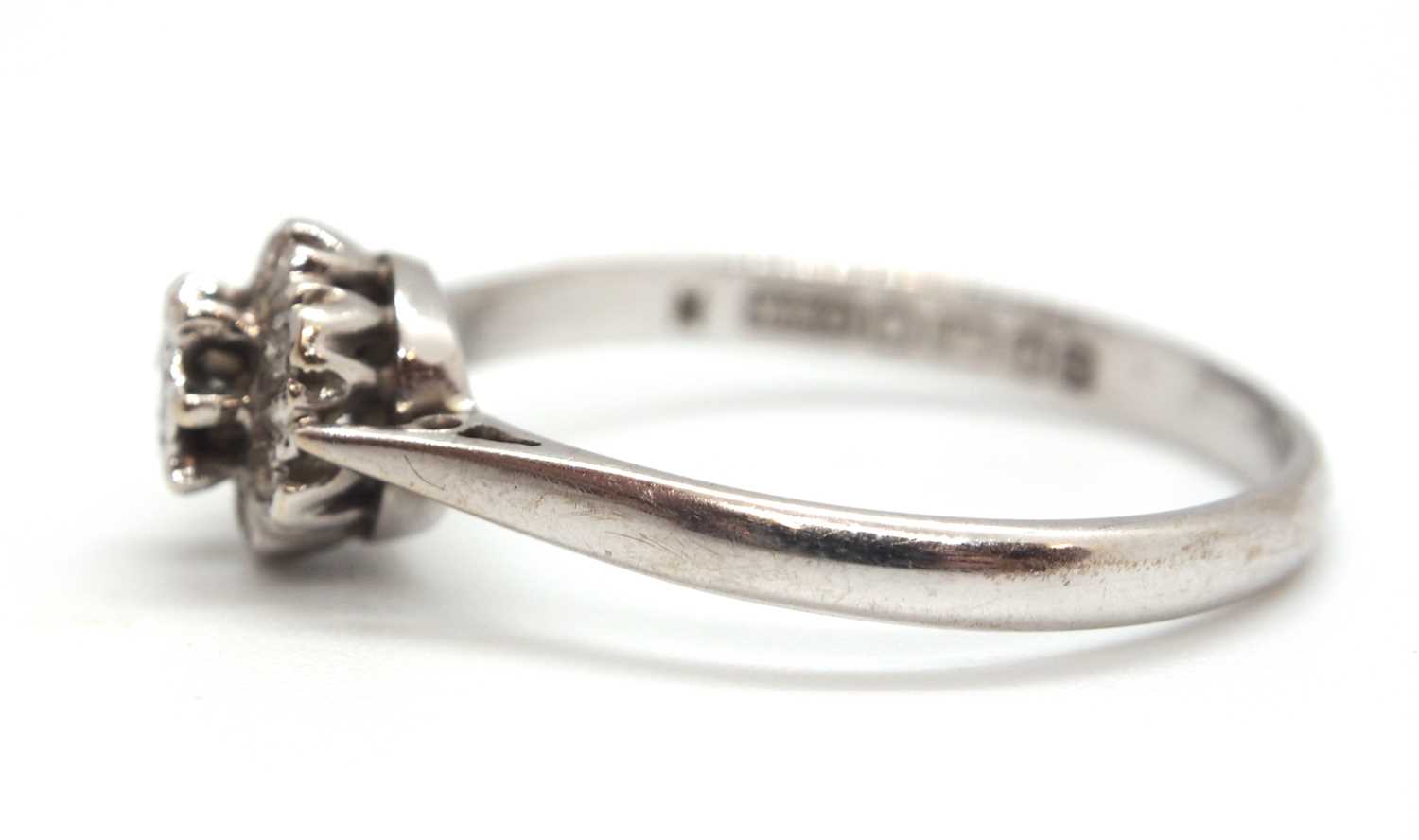 An 18ct white gold cluster ring, comprised of illusion mounted single cut diamonds, with plain - Image 7 of 7