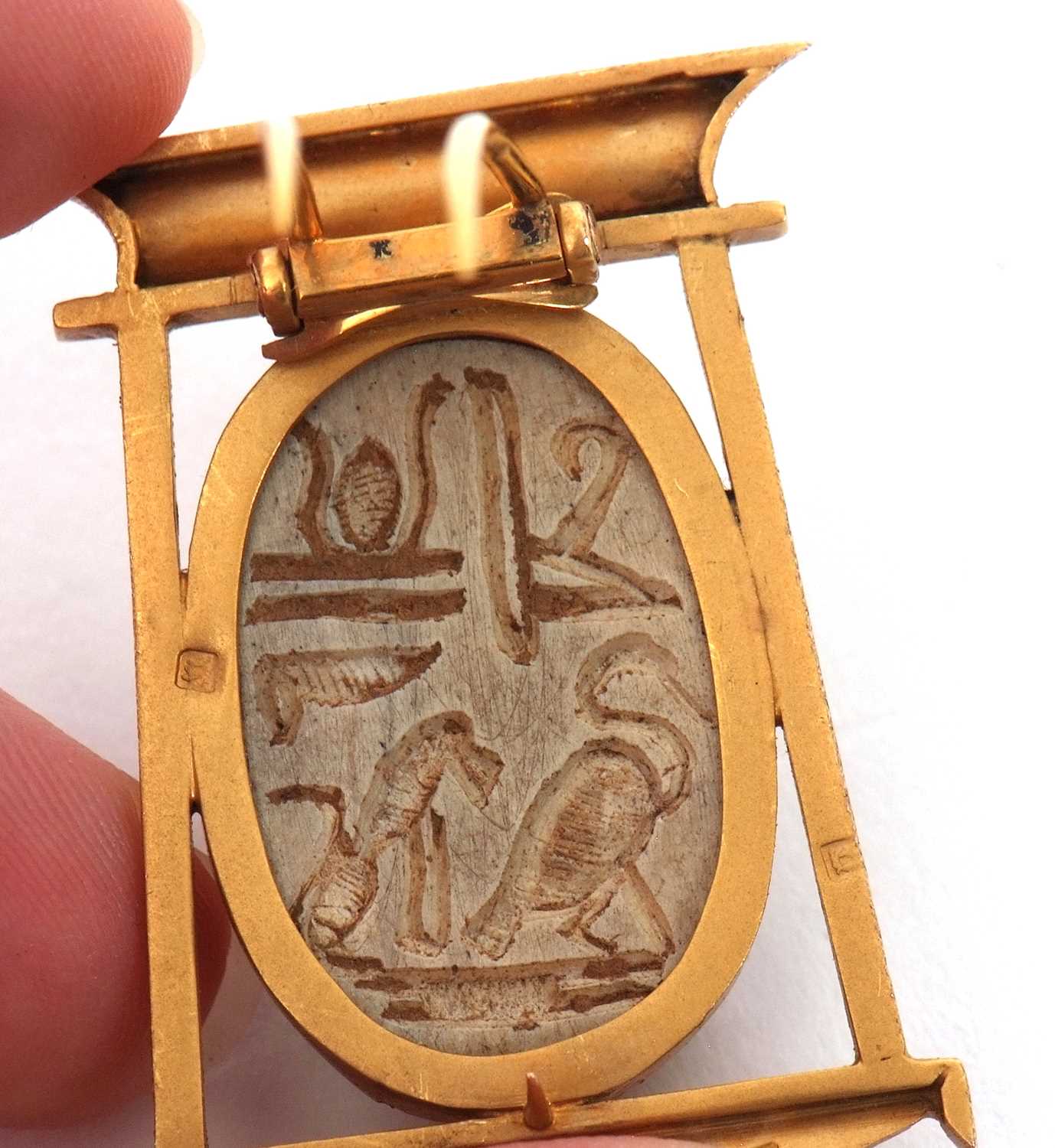 A scarab brooch, the carved stone scarab in a collet mount within a stylised Egyptian style frame, - Image 3 of 5