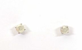 A pair of 14k diamond earstuds, the round brilliant cut diamonds estimated approx. 0.12cts each (0.