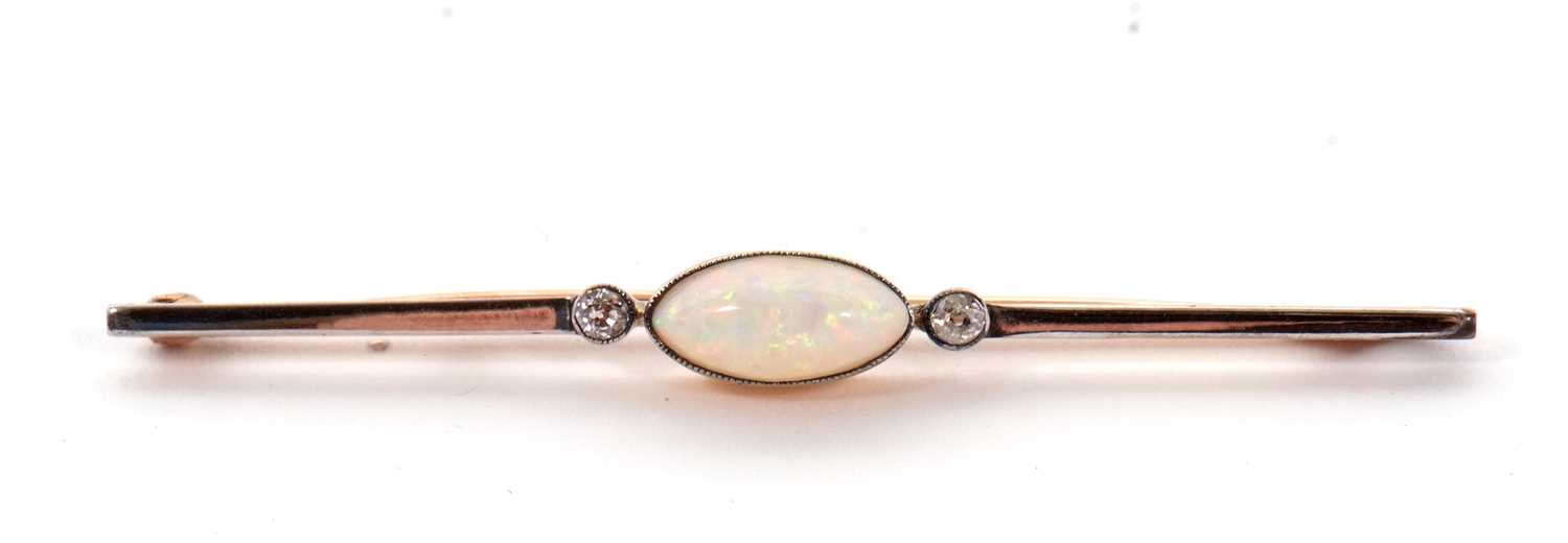 An opal and diamond bar brooch, the central oval marquise shape opal cabochon, approx. 11mm long x - Image 2 of 5
