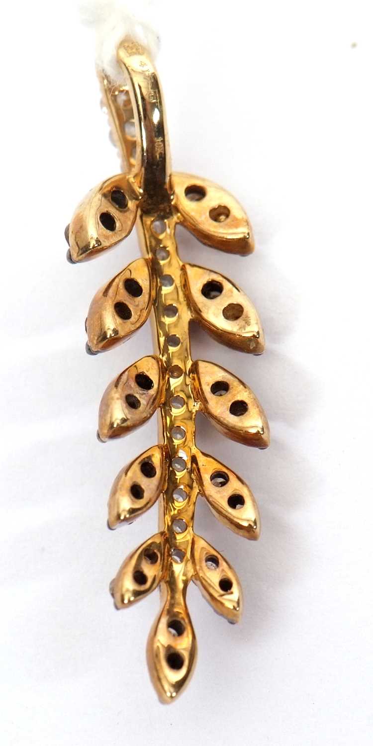 A 9ct brown and white diamond leaf pendant, the stem set with round white diamonds and the leaves - Image 2 of 2