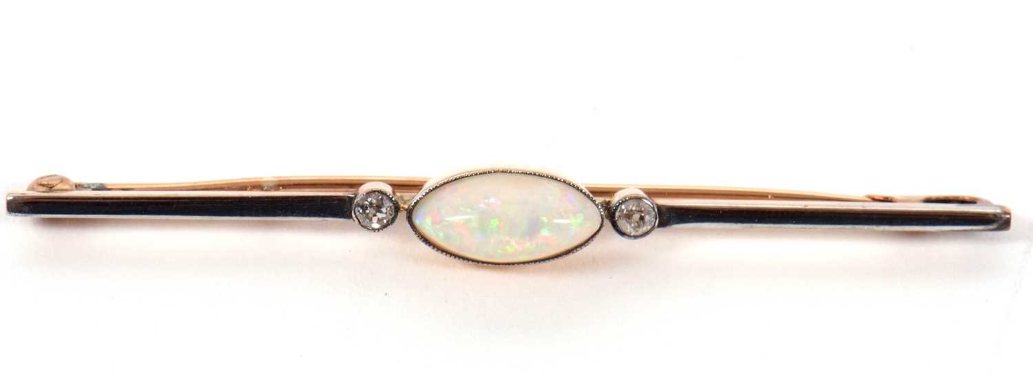 An opal and diamond bar brooch, the central oval marquise shape opal cabochon, approx. 11mm long x - Image 3 of 5