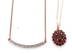 A 9ct garnet cluster necklace and a silver rose gold plated and diamond necklace: the garnet cluster