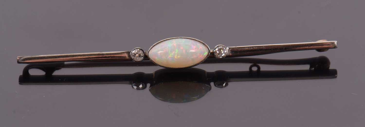 An opal and diamond bar brooch, the central oval marquise shape opal cabochon, approx. 11mm long x - Image 5 of 5