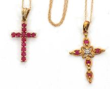Two 9ct ruby cross necklaces: the first set with small round rubies with tapered bale stamped 375