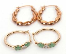 Two pairs of 9ct earrings: the first pair each set with two pale green cloudy emeralds and a