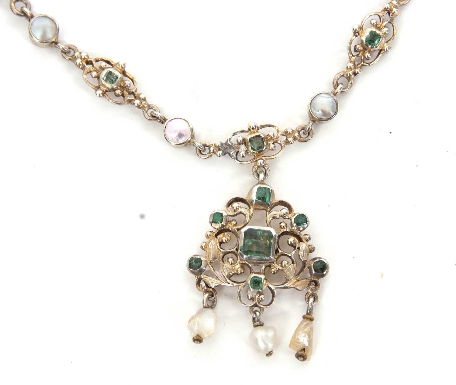 A 19th century style emerald and cultured pearl pendant necklace, the pendant set with a central