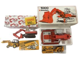 A mixed lot of boxed die-cast construction vehicles, to include: - 1000 Poclain - 350 CK Pelle