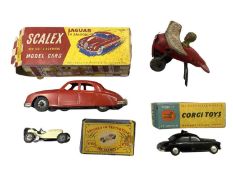A mixed lot of various die-cast and tinplate toys, to include: - Boxed Scalex clockwork car -