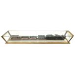 A glazed display case containing a 00 gauge locomotive, tender and wagons. Length approximately: