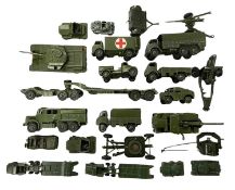 A collection of playworn die-cast military vehicles, predominantely Dinky, with some Lesney and