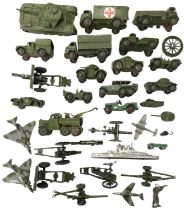 A collection of various playworn die-cast Dinky military vehicles