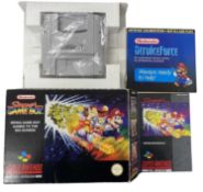 A boxed Nintendo Super Game Boy TV/Console adapter