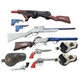 A collection of various vintage toy guns, to include: - Marx machine gun - Crescent 'Rustler Range