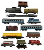 A mixed lot of various 00 gauge rolling stock, predominantely LIMA