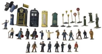 A collection of playworn Dinky lineside accessories and figures, to include AA/RAC Telephone Box,