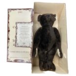 A boxed limited edition Steiff British Collector's 1907 Replica Teddy Bear in dark brown with