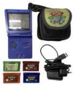 A Game Boy Advance SP handheld console, with Pokemon carry case and 4 x Pokemon game cartridges (