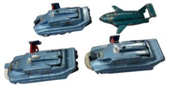 A collection of playworn die-cast Dinky TV toys, to include: - Thunderbird 2 - Spectrum Pursuit