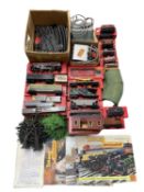 A large quantity of Triang 00 gauge rolling stock, to include track, outbuildings, foliage, tankers,