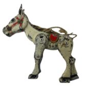 A playworn MOKO Muffin the Mule puppet, requiring restringing
