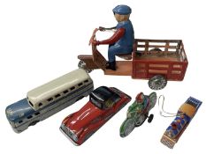 Five tinplate toys, to include: - Greyhound bus by Daiya (JP) - Motorcycle and Rider (JP) -
