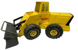 A large pressed steel Tonka digger